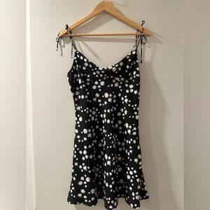 Black cowl neck dress with daisies